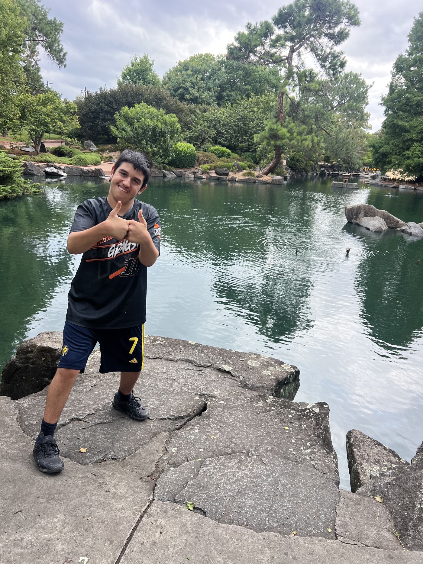 A young person enjoying a relaxed day out in the gardens